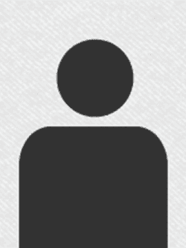 A simple black silhouette of a person on a light gray, textured background. The figure consists of a circular head and a rectangular body, resembling a generic user or profile icon.